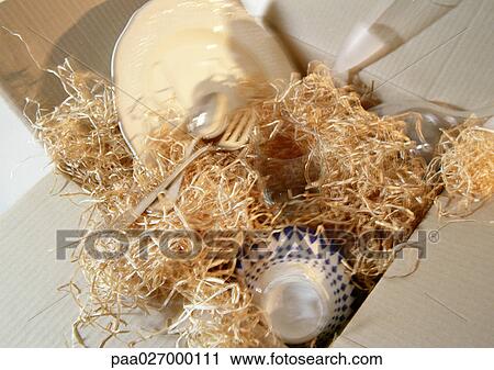 Stock Image - Dishes and silverware in packaging. Fotosearch
