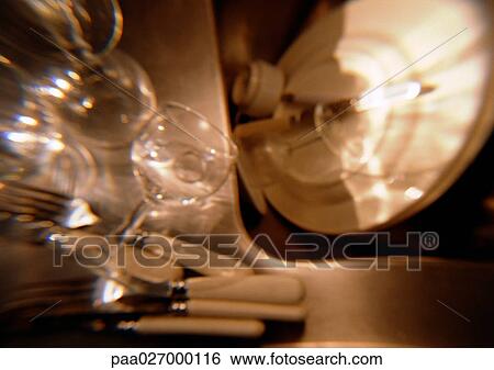 Dishes, glasses, silverware, blurred View Large Photo Image Stock Photograph - Dishes, glasses, silverware, blurred. Fotosearch