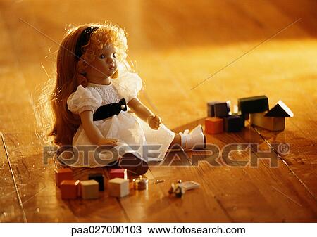 Doll on floor with blocks View Large Photo Image Stock Image - Doll on floor with blocks. Fotosearch