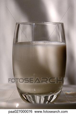 Glass of milk, close-up View Large Photo Image Stock Photograph - Glass of milk, close-up. Fotosearch