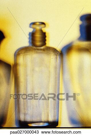 Glass perfume bottles, close-up, blurred View Large Photo Image Stock Image - Glass perfume bottles, close-up, blurred. Fotosearch