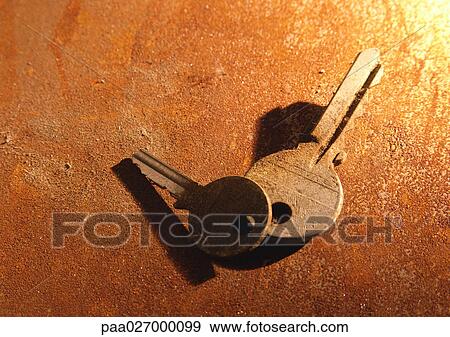 Keys on dusty surface, close-up View Large Photo Image Stock Photo - Keys on dusty surface, close-up. Fotosearch