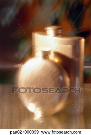 Metal flasks, blurred View Large Photo Image Stock Photo - Metal flasks, blurred. Fotosearch