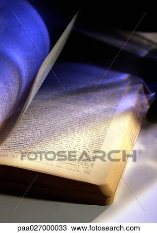 Open book, in shadows, close-up View Large Photo Image Stock Image - Open book, in shadows, close-up. Fotosearch