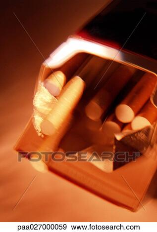 Pack of cigarettes, close-up, blurred View Large Photo Image Stock Photo - Pack of cigarettes, close-up, blurred. Fotosearch