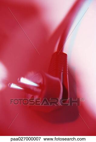 Plug, red-toned, close-up View Large Photo Image Stock Photo - Plug, red-toned, close-up. Fotosearch