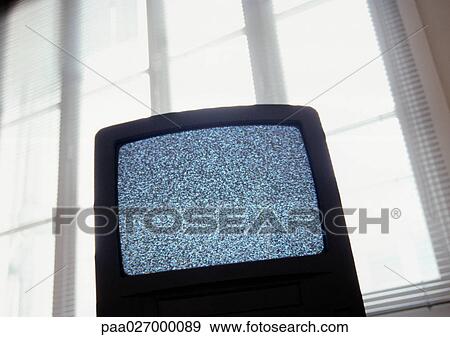 Static on television screen, back lit, low angle view View Large Photo Image Stock Photo - Static on television screen, back lit, low angle view. Fotosearch