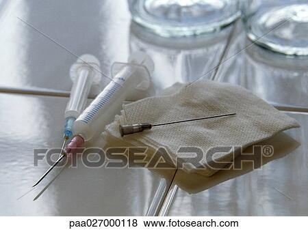 Syringes and gauze View Large Photo Image Stock Photo - Syringes and gauze. Fotosearch