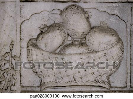Relief in stone of basket full of pomegranates, close-up View Large Photo Image Stock Image - Relief in stone of basket full of pomegranates, close-up. Fotosearch