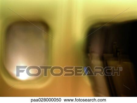 Window in airplane, blurred. View Large Photo Image Stock Image - Window in airplane, blurred.. Fotosearch