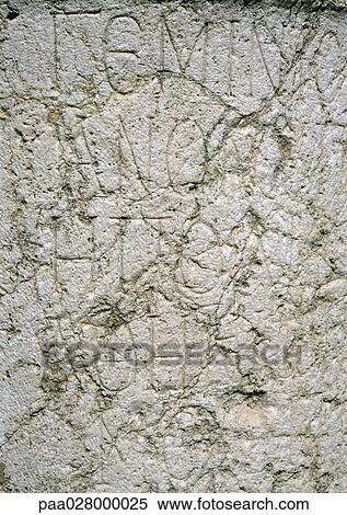 Stock Photography - Words carved into stone.. Fotosearch