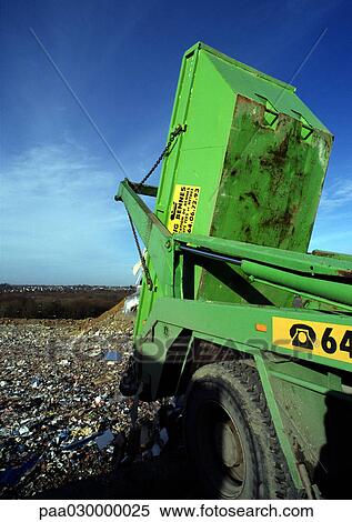 Dump truck in landfill. View Large Photo Image Stock Photography - Dump truck in landfill.. Fotosearch