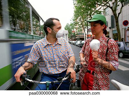 France, Paris, people standing by moving bus with pollution masks. View Large Photo Image Stock Photo - France, Paris, people standing by moving bus with pollution masks.. Fotosearch