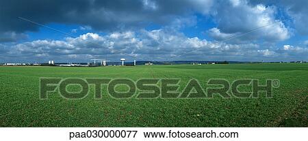 Green field near construction site. View Large Photo Image Stock Photo - Green field near construction site.. Fotosearch