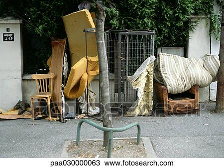 Old furniture lined up in front of wall on sidewalk View Large Photo Image Stock Image - Old furniture lined up in front of wall on sidewalk. Fotosearch
