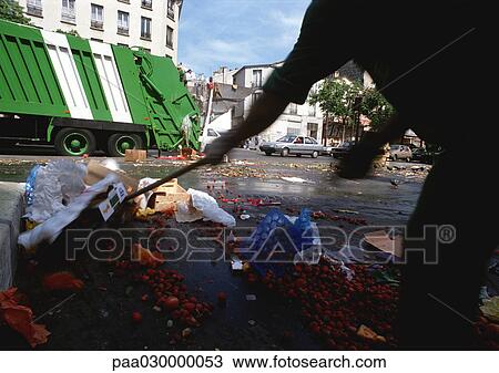 Person cleaning trash off the streets. View Large Photo Image Stock Image - Person cleaning trash off the streets.. Fotosearch