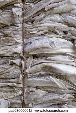Pile of clear plastics bound together. View Large Photo Image Stock Image - Pile of clear plastics bound together.. Fotosearch