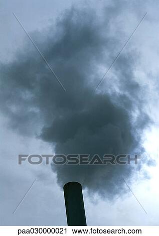 Smoke from a smoke stack, low angle view View Large Photo Image Stock Image - Smoke from a smoke stack, low angle view. Fotosearch