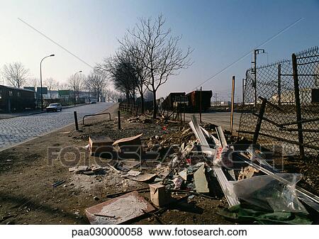 Trash pile across the street from residential area. View Large Photo Image Stock Photo - Trash pile across the street from residential area.. Fotosearch
