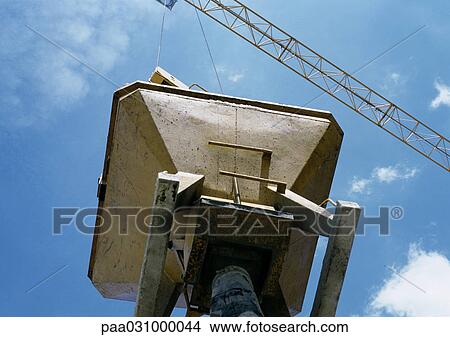Cement mixer, low angle view View Large Photo Image Picture - Cement mixer, low angle view. Fotosearch