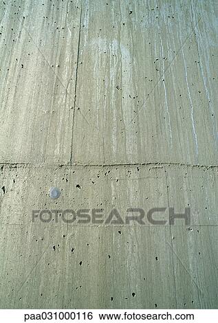 Stock Photograph - Concrete wall, close-up. Fotosearch
