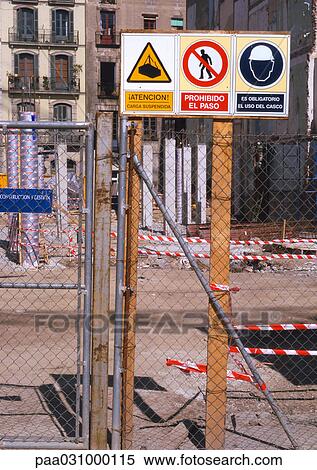 Construction site with signs saying "no entry" in Spanish View Large Photo Image Stock Photography - Construction site with signs saying "no entry" in Spanish. Fotosearch