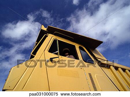 Stock Photography - Construction vehicle, low angle view. Fotosearch
