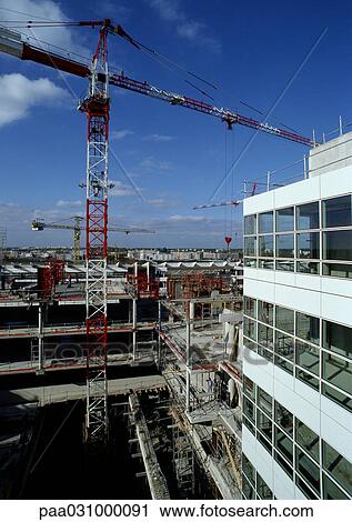 Crane in construction site View Large Photo Image Stock Image - Crane in construction site. Fotosearch
