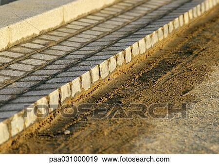 Freshly laid paving stones View Large Photo Image Stock Photo - Freshly laid paving stones. Fotosearch
