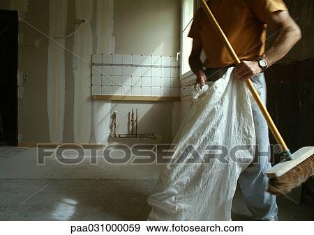 Man holding broom and bag, mid section View Large Photo Image Stock Photo - Man holding broom and bag, mid section. Fotosearch