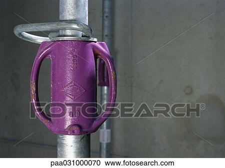 Stock Image - Metal pole, close-up. Fotosearch