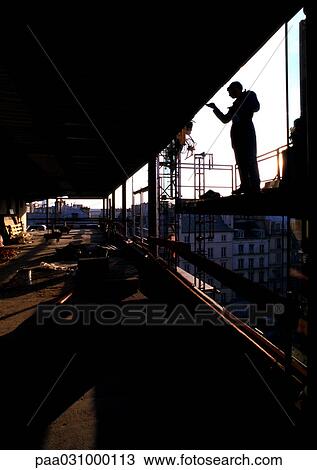 Silhouette of person in construction site View Large Photo Image Stock Image - Silhouette of person in construction site. Fotosearch