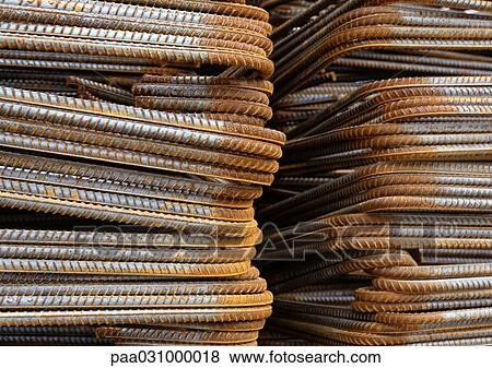 Stock Photo - Stacks of metal rods, close-up. Fotosearch