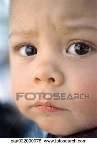 Stock Photo - Baby's face, close-up. Fotosearch