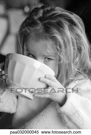 Little girl drinking from bowl, b&w View Large Photo Image Stock Photography - Little girl drinking from bowl, b&w. Fotosearch