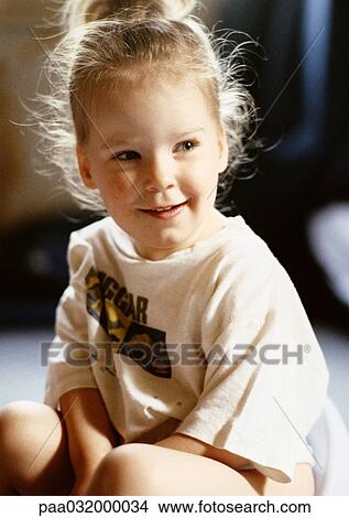 Little girl sitting View Large Photo Image Picture - Little girl sitting. Fotosearch
