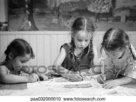 Stock Image - Three girls drawing, b&w. Fotosearch