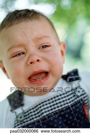 Stock Photograph - Toddler crying, close-up. Fotosearch