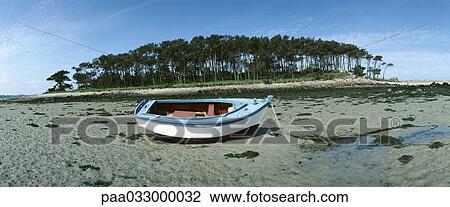 France, boat on seashore at low tide, island in background, panoramic view View Large Photo Image Stock Image - France, boat on seashore at low tide, island in background, panoramic view. Fotosearch
