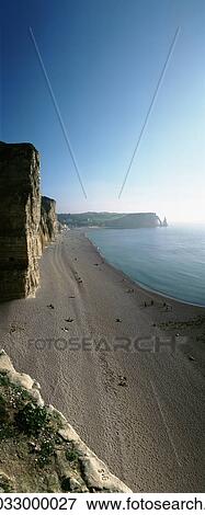 Stock Photo - France, cliff face and beach. Fotosearch