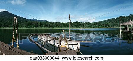 Picture - Indonesia, boat on lake, panoramic view. Fotosearch