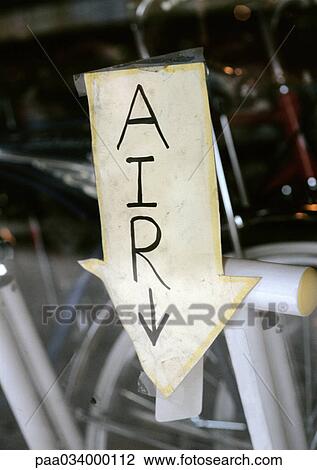 AIR text and arrow written on arrow sign, close-up View Large Illustration Drawing - AIR text and arrow written on arrow sign, close-up. Fotosearch