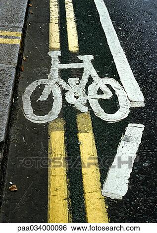 Stock Illustration - Bike symbol painted on road. Fotosearch