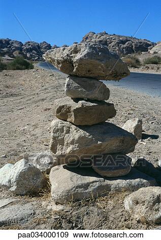 Stock Illustration - Cairn (pile of stones indicating path). Fotosearch