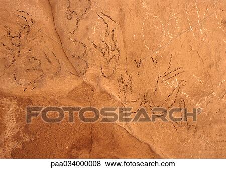 Drawings on rock wall, close-up View Large Illustration Stock Illustration - Drawings on rock wall, close-up. Fotosearch