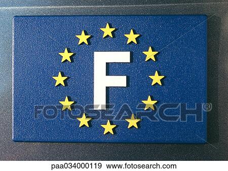 Stock Illustration - European union sign with letter "F" standing for France, close-up. Fotosearch