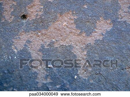 Stock Illustration - Jordan, Wadi Rum, Jebal Umm Ishrin, camel figure on wall, extreme close-up. Fotosearch