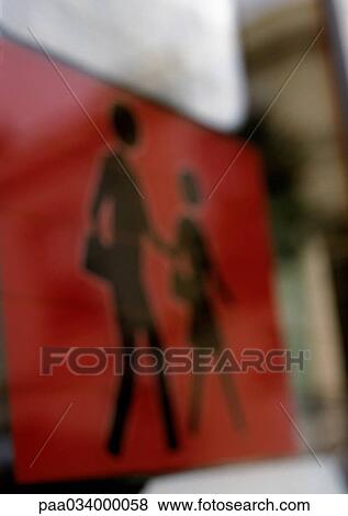 Stock Illustration - Pedestrian sign, blurred, close-up. Fotosearch