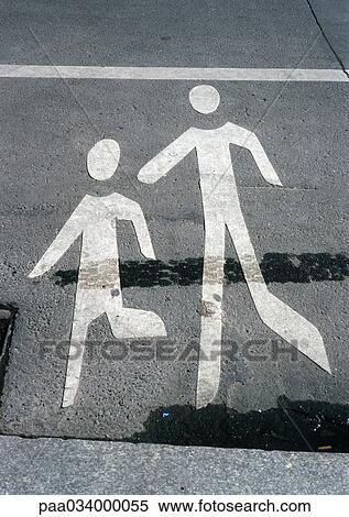 Stock Illustration - Pedestrian symbol painted on road. Fotosearch