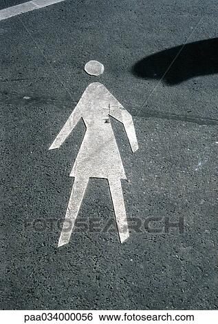 Stock Illustration - Pedestrian symbol painted on road. Fotosearch